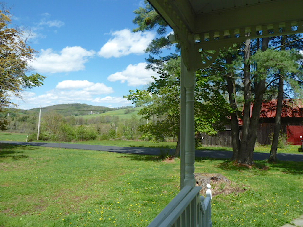 front porch to barn and view